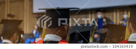 A large group of University graduation degree caps during ceremonies on commencement day A large group of University graduation degree caps during ceremonies on commencement day 104163419