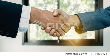 hands shake after business office executives are interviewing job applicants in the meeting room 104163971