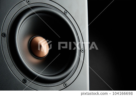 Multimedia acoustic sound speaker with copy space. Sound audio system on dark background Multimedia acoustic sound speaker with copy space. Sound audio system on dark background 104166698