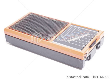 Old transistor radio isolated on white. Old transistor radio isolated on white. 104166900