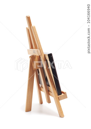 Artist wooden easel with canvas isolated on white 104166940