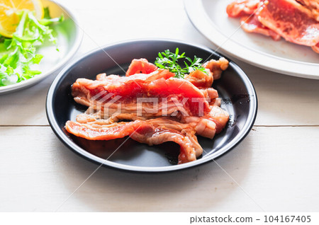 seasoned meat on a plate 104167405