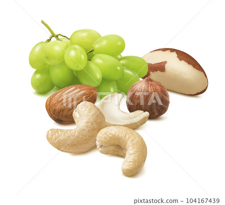 Green grapes, cashew, almond, hazelnut and brazil nuts isolated on white background Green grapes, cashew, almond, hazelnut and brazil nuts isolated on white background 104167439