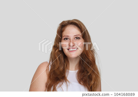 Beautiful mid adult woman with curly ginger hairstyle portrait Beautiful mid adult woman with curly ginger hairstyle portrait 104168089