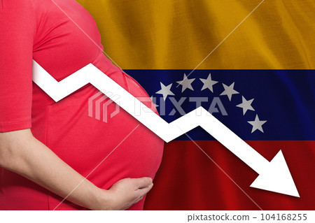Pregnant woman on Venezuelan flag background. Falling fertility rate in Venezuela Pregnant woman on Venezuelan flag background. Falling fertility rate in Venezuela 104168255