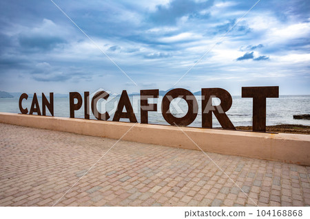 Signpost on promenade. Can Picafort Beach. Balearic Islands Mallorca Spain. 104168868