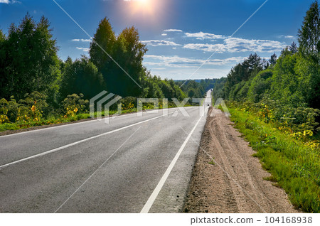 Russia, Tver region, road to Lake Seliger extending distance to the horizon Russia, Tver region, road to Lake Seliger extending distance to the horizon 104168938