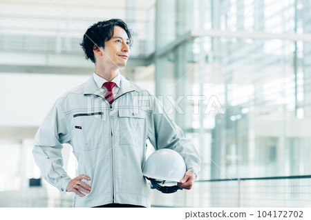 A worker man with a helmet 104172702