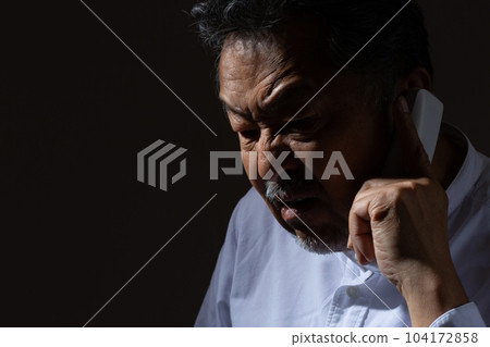 senior man calling angrily senior man calling angrily 104172858