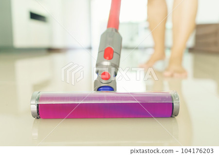 clean floor with a vacuum cleaner at home clean floor with a vacuum cleaner at home 104176203