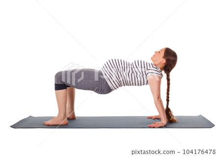 Pregnancy yoga exercise - pregnant woman doing yoga asana Purvottanasana Upward Plank Pose isolated on white background Pregnancy yoga exercise - pregnant woman doing yoga asana Purvottanasana Upward Plank Pose isolated on white background 104176478