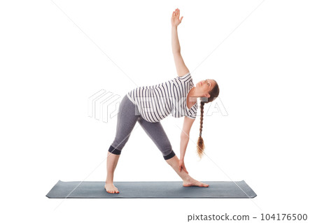 Pregnancy yoga exercise - pregnant woman doing asana Utthita trikonasana - extended triangle pose isolated on white background Pregnancy yoga exercise - pregnant woman doing asana Utthita trikonasana - extended triangle pose isolated on white background 104176500