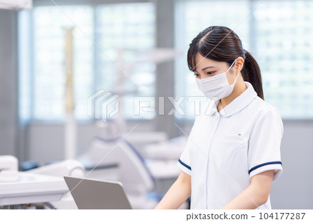 A nurse working on medical DX. A nurse working on medical DX. 104177287
