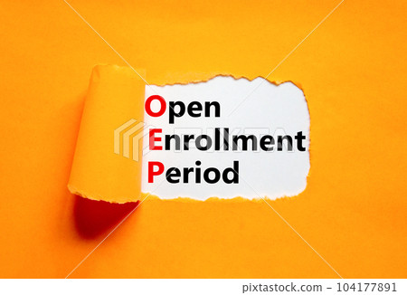 OEP symbol. Concept words OEP Open enrollment period on beautiful white paper. Beautiful orange table orange background. Medical and OEP Open enrollment period concept. Copy space. 104177891