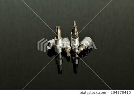 Removable nozzles of different configurations for a screwdriver. 104178410