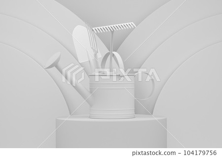 Watering can with garden tools on cylinder podium with step on monochrome 104179756