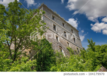 Old abandoned fortress barracks in Kamianets-Podilskyi, Ukraine. 104179970
