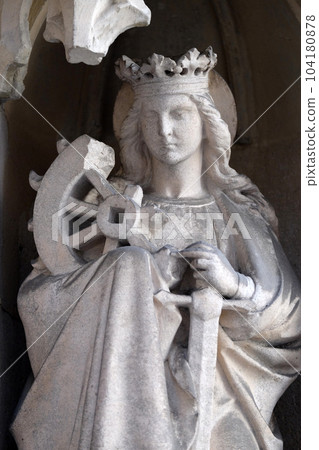 Saint Catherine of Alexandria on the portal of Parish Church of the Holy Blood in Graz, Styria, Austria 104180878