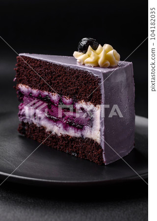 Delicious fresh blueberry or blackcurrant cake with cream cheese Delicious fresh blueberry or blackcurrant cake with cream cheese 104182035