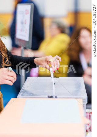 voting democracy background. Unrecognizable hispanic woman hand in candidate election referendum voting democracy background. Unrecognizable hispanic woman hand in candidate election referendum 104183727