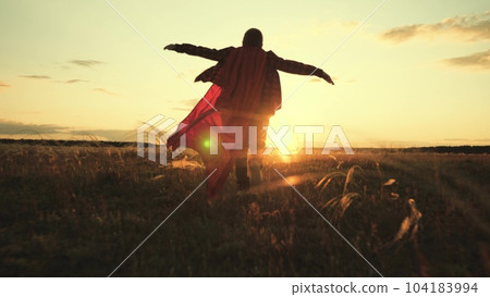 little boy red cape runs sunset, silhouette superhero child running victory, freedom children dream, holiday mood sunset, dream holiday happy family, running child journey, freedom victory forward 104183994