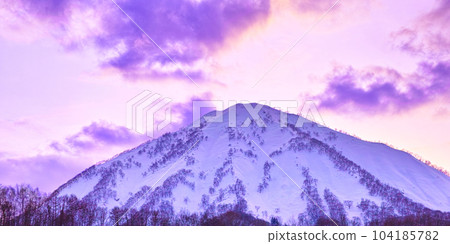 Snow scene of Mt. Shiribetsu in spring evening Snow scene of Mt. Shiribetsu in spring evening 104185782