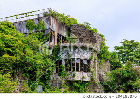 Ruined cliff building Ruined cliff building 104185870