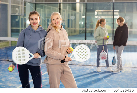 Portrait of two woman tennis players Portrait of two woman tennis players 104186430