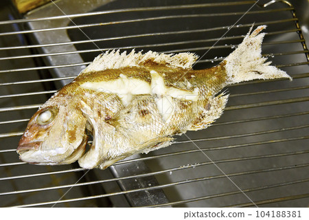 Grilled sea bream with salt Grilled sea bream with salt 104188381