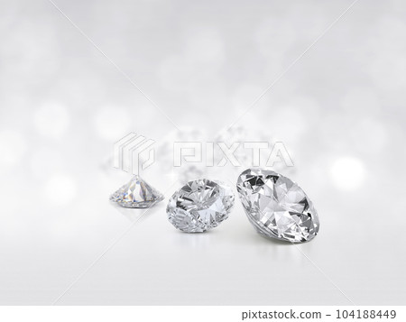 still with expensive cut diamonds in front of a white background, reflections on the ground. Lot of copy space 104188449