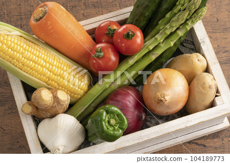 Vegetables in a wooden box Vegetables in a wooden box 104189773