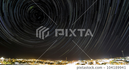 Night view of Nemuro city and star trails (long exposure) / Nemuro, Japan Night view of Nemuro city and star trails (long exposure) / Nemuro, Japan 104189941