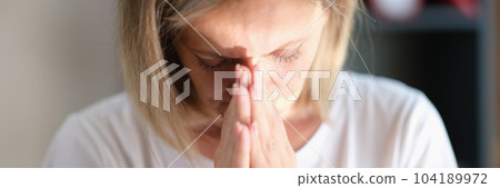 Sad depressed woman feeling bad crying hopelessly alone closeup Sad depressed woman feeling bad crying hopelessly alone closeup 104189972