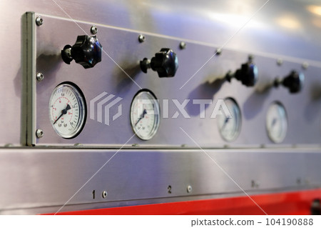 industrial equipment with pressure gauges 104190888