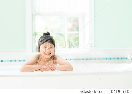 A child taking a bath A child taking a bath 104191588