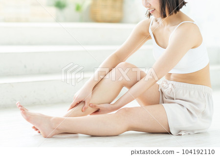 Women with leg skin care 104192110