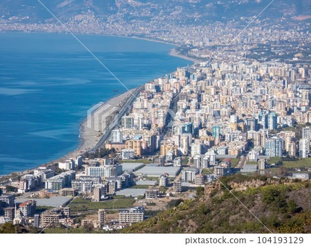 Alanya, Turkey - Jan 4, 2023. View of the Alanya city from the height of the ancient city of Syedra, Mediterranean coast 104193129
