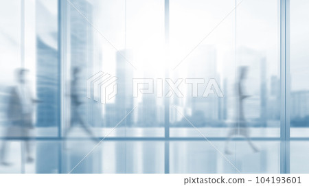 motion blur of people walking on  glass window wall building background office blur abstract background from building hallway 104193601