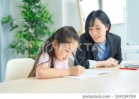 A girl studying and a woman in a suit to support A girl studying and a woman in a suit to support 104194769