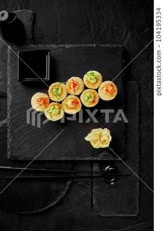 Baked norimaki with melted cheese served with gari and soy sauce Baked norimaki with melted cheese served with gari and soy sauce 104195334