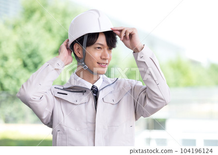 Business portrait of a man wearing work clothes Business portrait of a man wearing work clothes 104196124