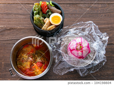 Homemade bento box: Chinese cabbage rolls and red turnip rice balls Homemade bento box: Chinese cabbage rolls and red turnip rice balls 104198604