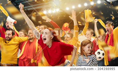 Young people, football fans attending match to watch game and cheer up favourite sport team. Loudly shouting. Little girl with misunderstanding expression 104198995