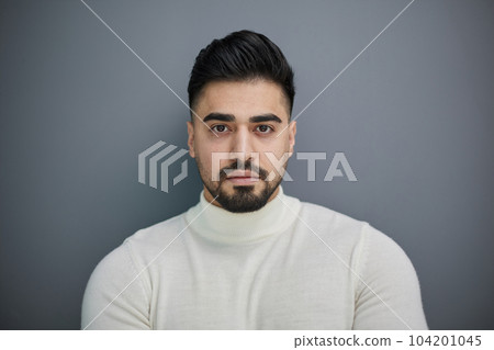 Portrait of stylish middle aged man posing on gray background Portrait of stylish middle aged man posing on gray background 104201045