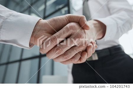 Business handshake of meeting or seminar room partner, business success and partnership concept 104201743