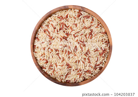 bowl of dry brown rice isolated on white background 104203837