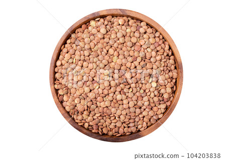 bowl of dry lentils isolated on white background 104203838