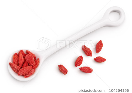 Dried goji berries in ceramic spoon isolated on white background. Top view. Flat lay. 104204396