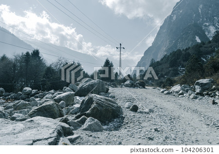 Boulder Rocks besides Himalayan Mountain uphill road. Himalayan Pradesh India Boulder Rocks besides Himalayan Mountain uphill road. Himalayan Pradesh India 104206301