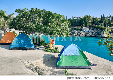 Campground in sea lagoon 104207863